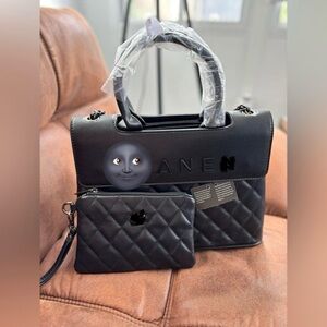 Elegant Black Quilted Satchel and Pouch